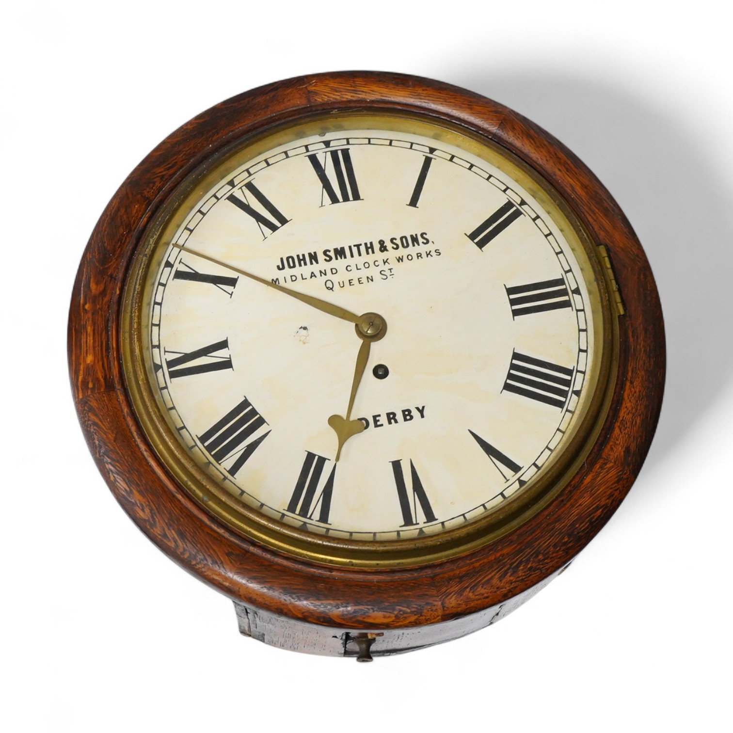 A John Smith & Sons of Derby oak wall clock, 39cm